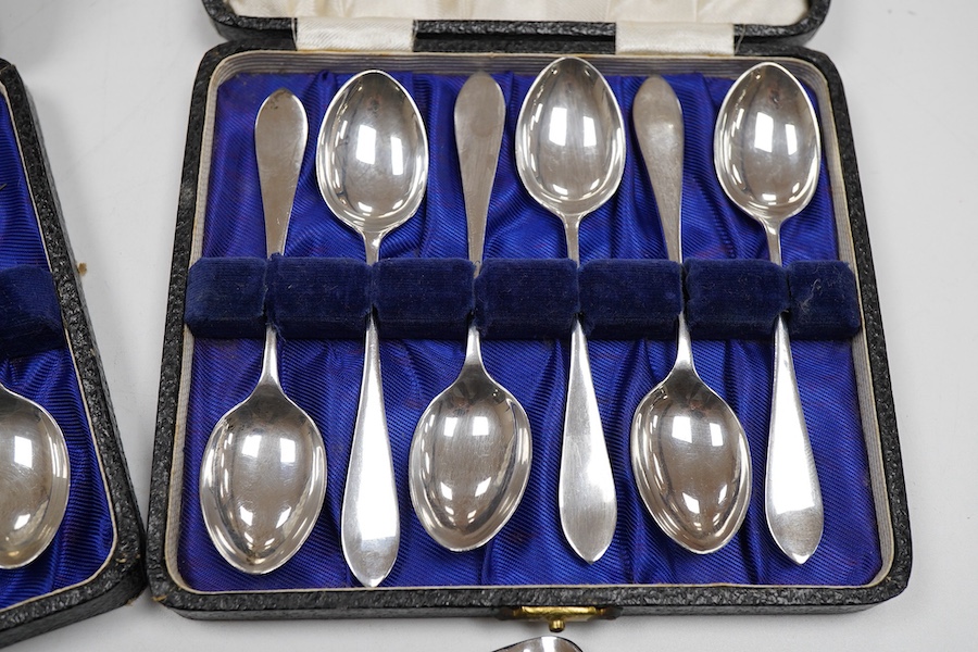 Two cased sets of six George VI silver teaspoons, Haseler & Restall, Birmingham, 1947, together with three assorted 19th century silver berry spoons.